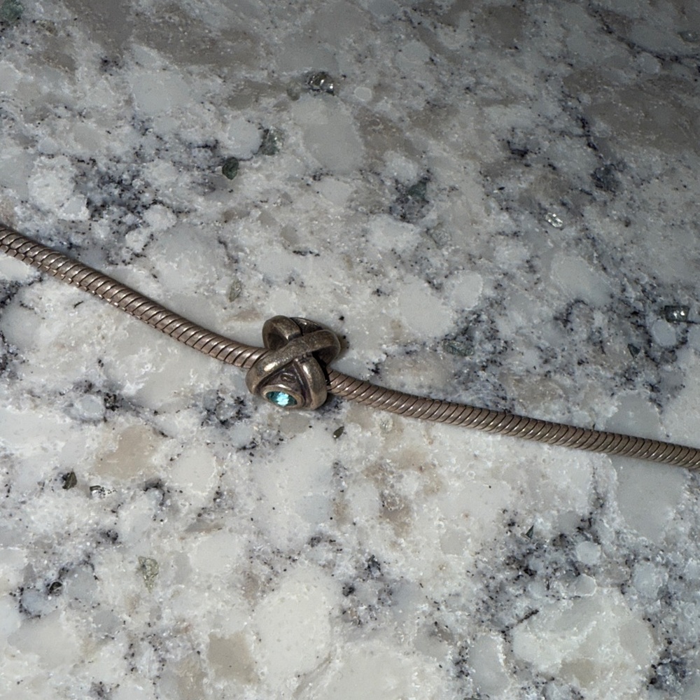 X Pandora bead with turquoise accent stone